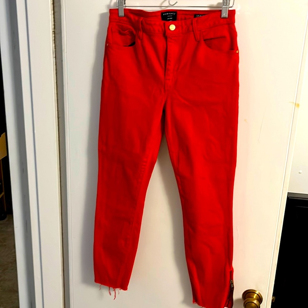 Women’s red frayed ankle denim pants